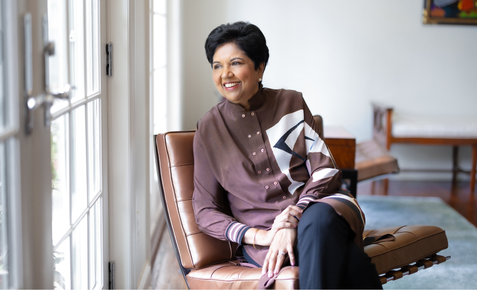 Indra Nooyi holding her book